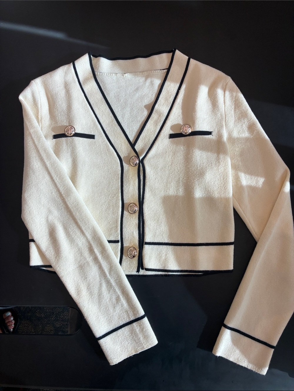 Cropped Cream V-Neck Cardigan with Black Trim